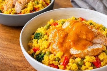 Corryreis mit Hähnchen und Mangosoße